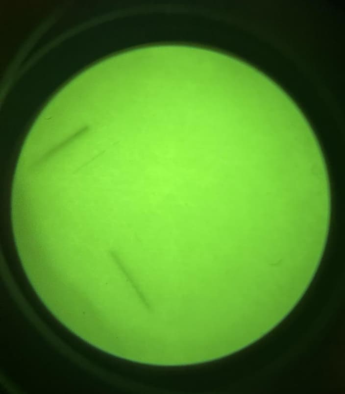 Blems visible against a white wall test